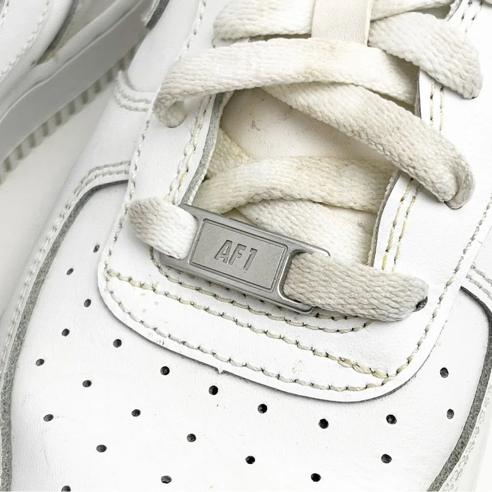 Nike leather triple